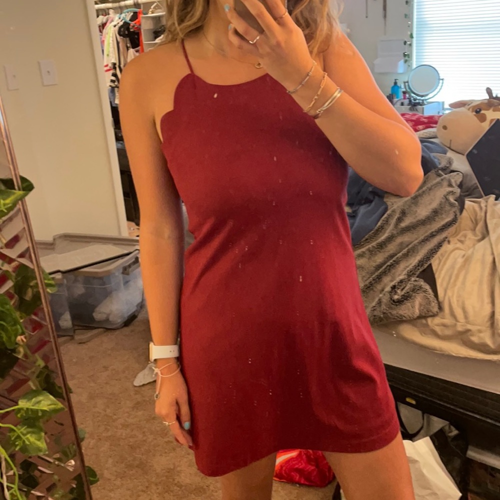 Scalloped edged red shade dress